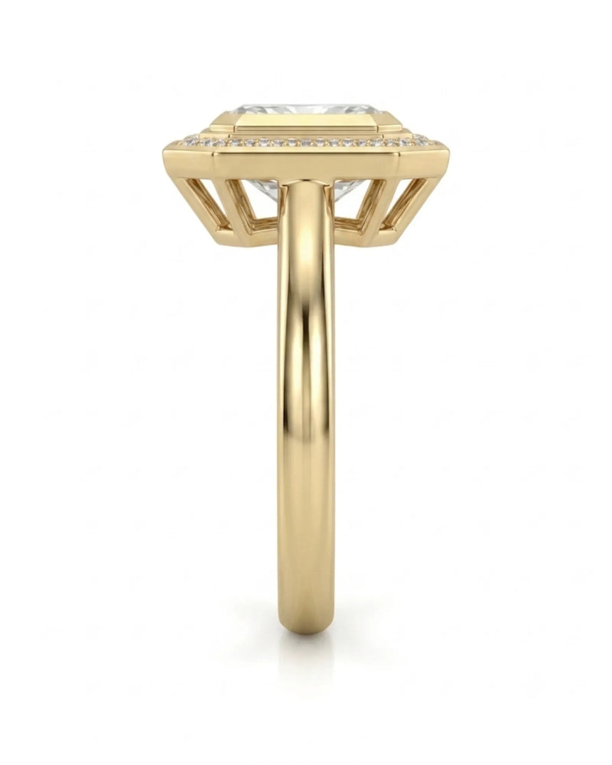Elegant radiant moissanite bezel ring with clipped-corner halo in 18K yellow gold | SARATTI