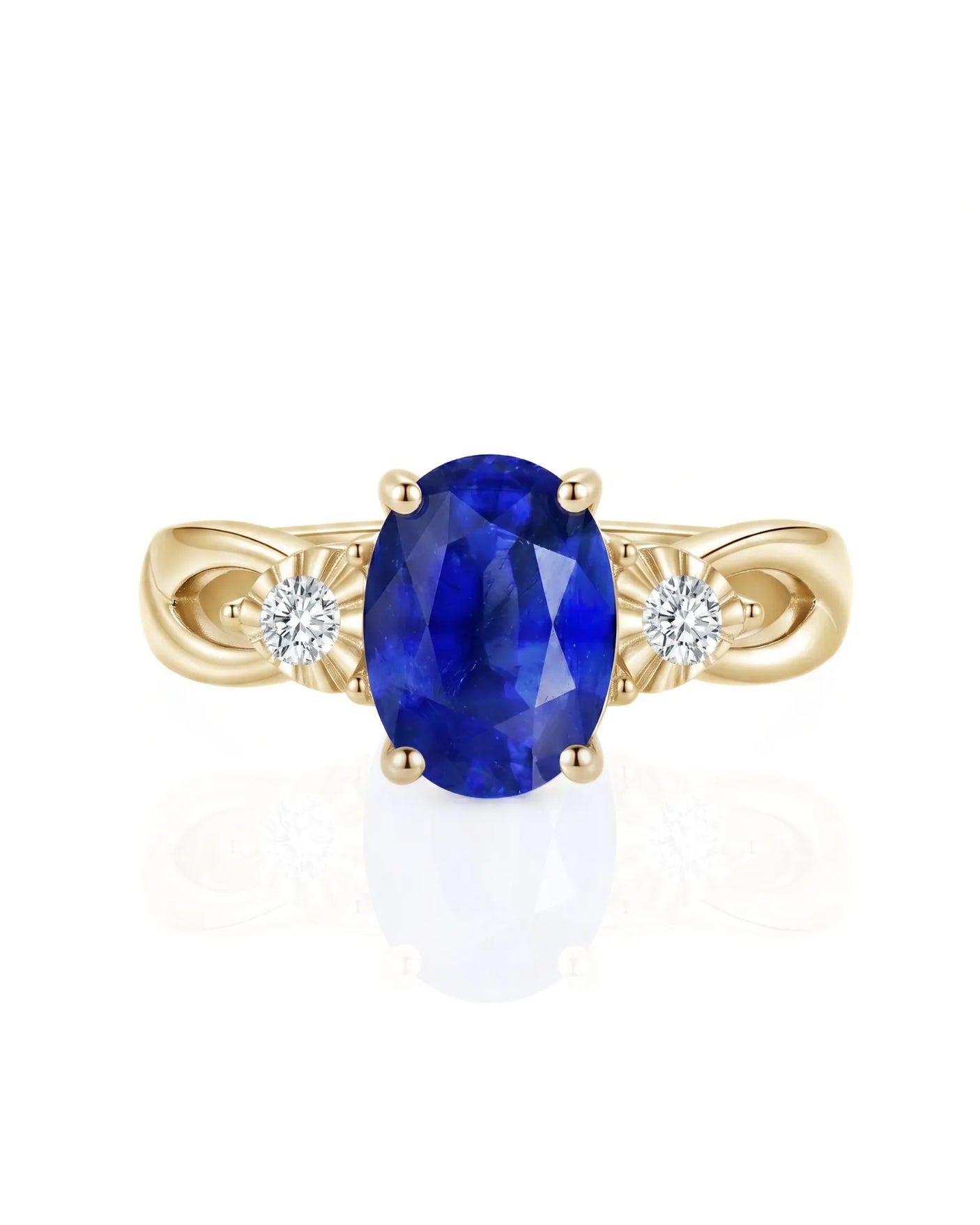 Elegant three stone sapphire and diamond engagement ring in 18K yellow gold | SARATTI