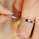 Elegant white gold wedding rings with shimmering diamond accents | Saratti