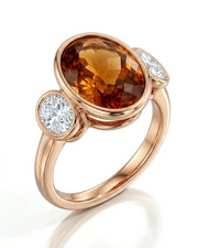 Elevated setting allows light to move through the center gemstone in rose gold | SARATTI