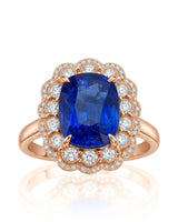 Elongated cushion natural sapphire ring framed by luminous diamonds in 18K rose gold | SARATTI