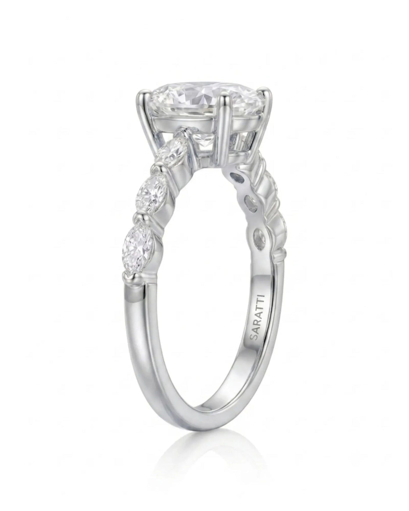 Elongated oval moissanite ring with leaf-like marquise accents and enduring polished platinum setting -- SARATTI
