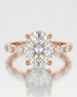 Elongated oval moissanite ring with leaf-like marquise accents and romantic 18K rose gold setting -- SARATTI