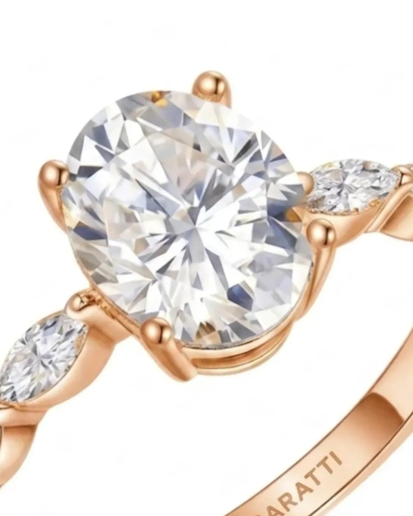 Elongated oval moissanite ring with leaf-like marquise accents and romantic 18K rose gold setting | SARATTI