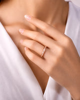 Emerald-cut diamond band with continuous step-cut brilliance and refined 18K rose gold craftsmanship | SARATTI