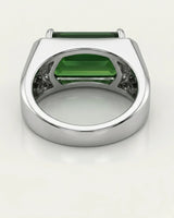 Emerald-cut green tourmaline ring with round brilliant diamonds in timeless platinum | SARATTI