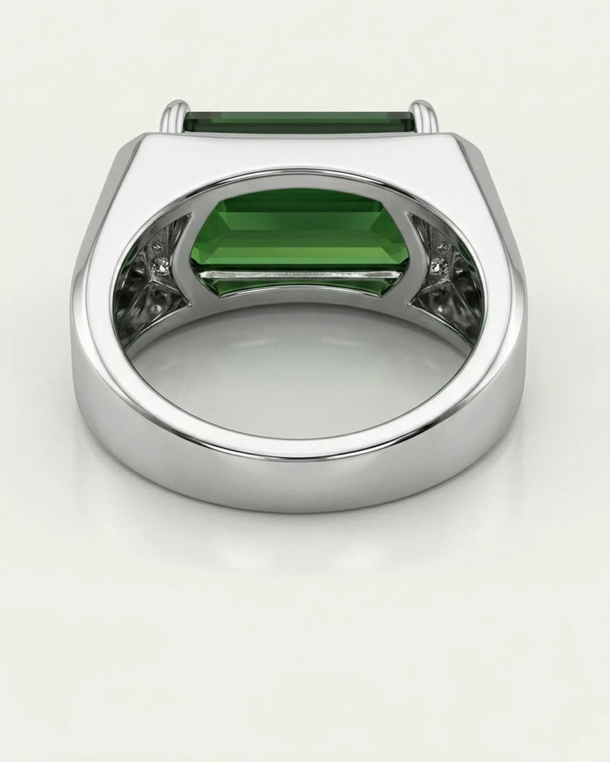 Emerald-cut green tourmaline ring with round brilliant diamonds in timeless platinum | SARATTI