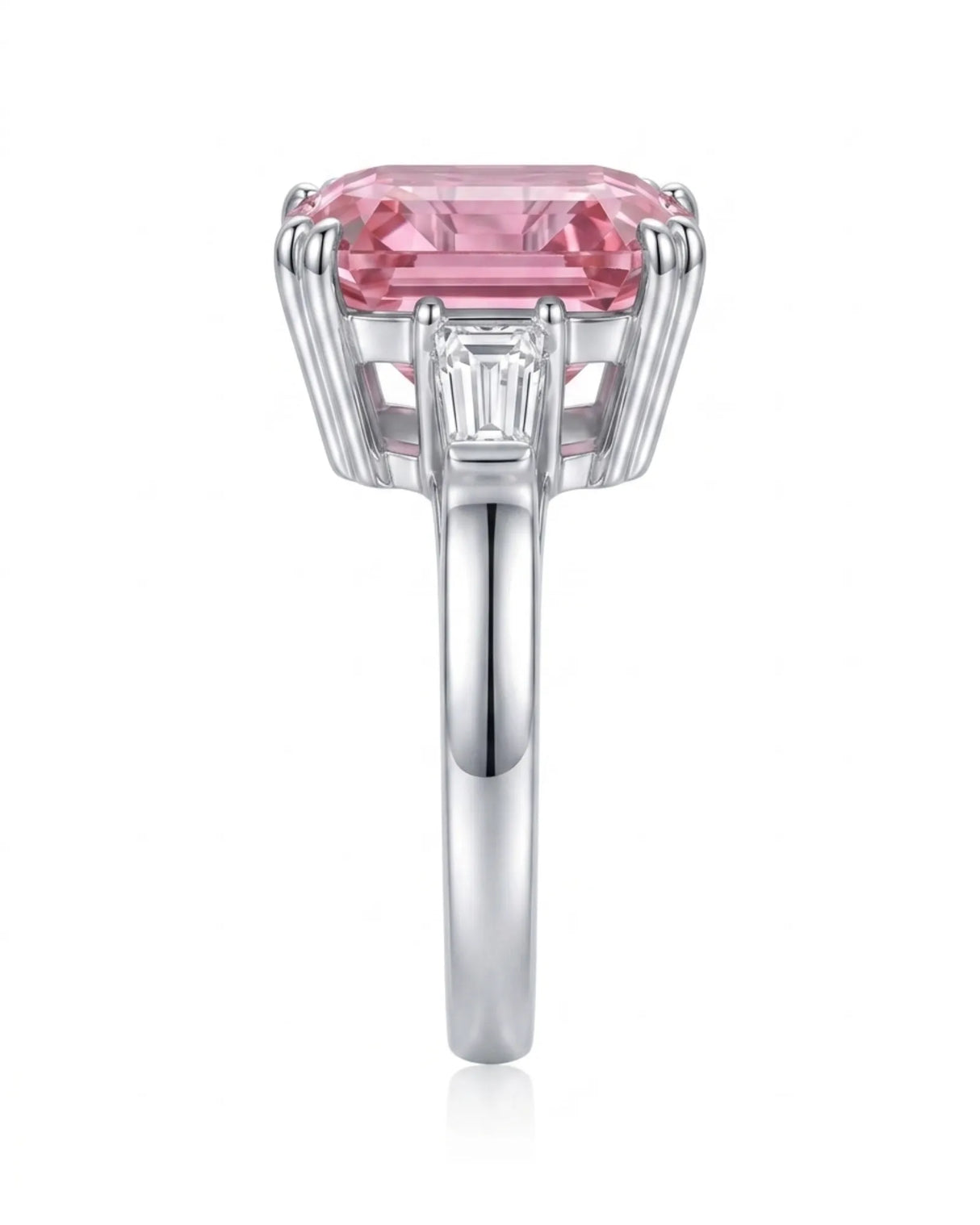 Emerald-cut pink tourmaline ring with baguette-cut diamonds in a platinum design | SARATTI