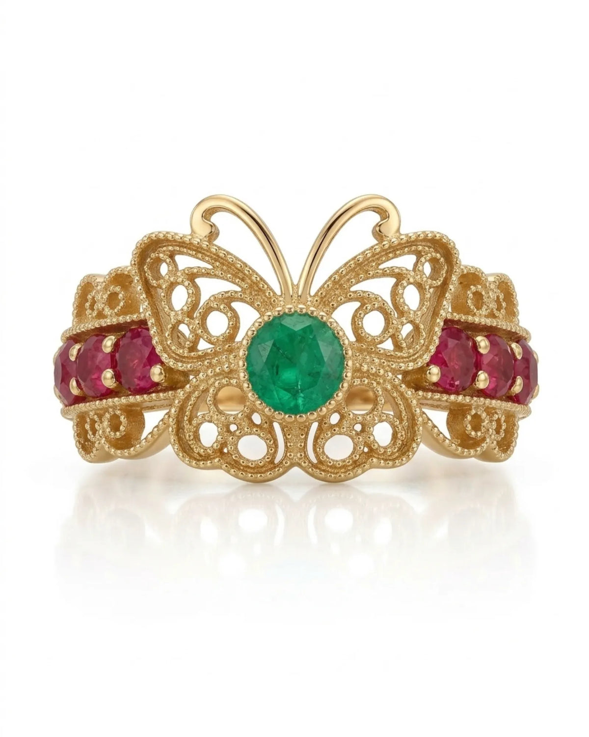Emerald and ruby ring featuring a green centre gemstone with vivid red accents in 18K gold | SARATTI