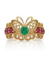 Emerald and ruby ring featuring a green centre gemstone with vivid red accents in 18K gold | SARATTI