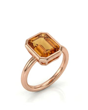 Emerald cut Imperial Topaz double halo setting in 18K rose gold | SARATTI