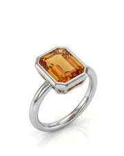 Emerald cut Imperial Topaz double halo setting in platinum | SARATTI
