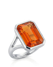 Emerald cut Natural Imperial Topaz bezel setting in platinum | SARATTI