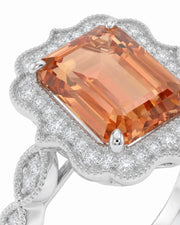 Emerald cut Natural Imperial Topaz diamond halo setting in 18K rose gold | SARATTI