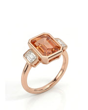 Emerald cut Natural Imperial Topaz three-stone bezel setting in 18K rose gold | SARATTI