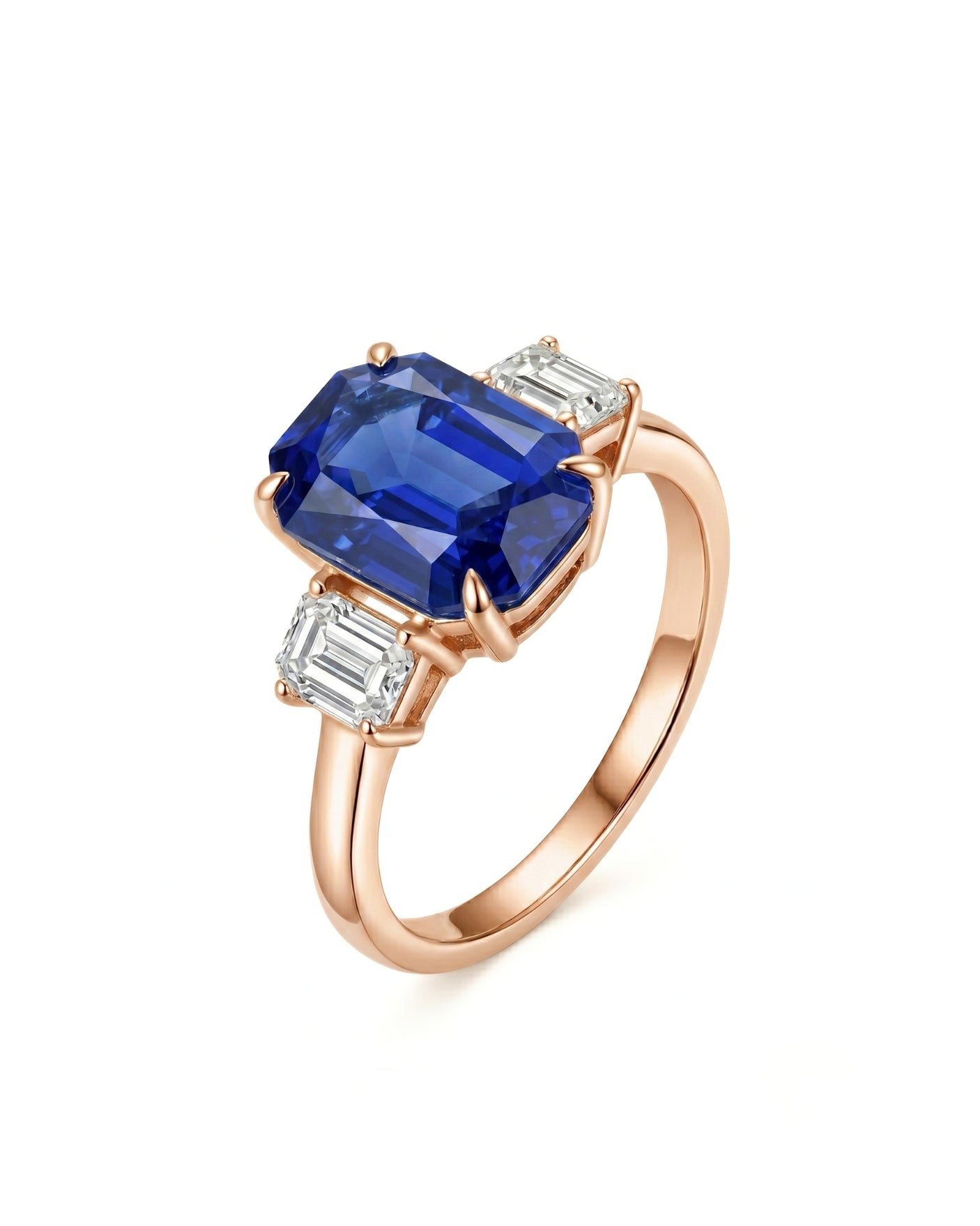 Emerald cut blue sapphire ring with emerald cut diamond accents in 18K rose gold | SARATTI