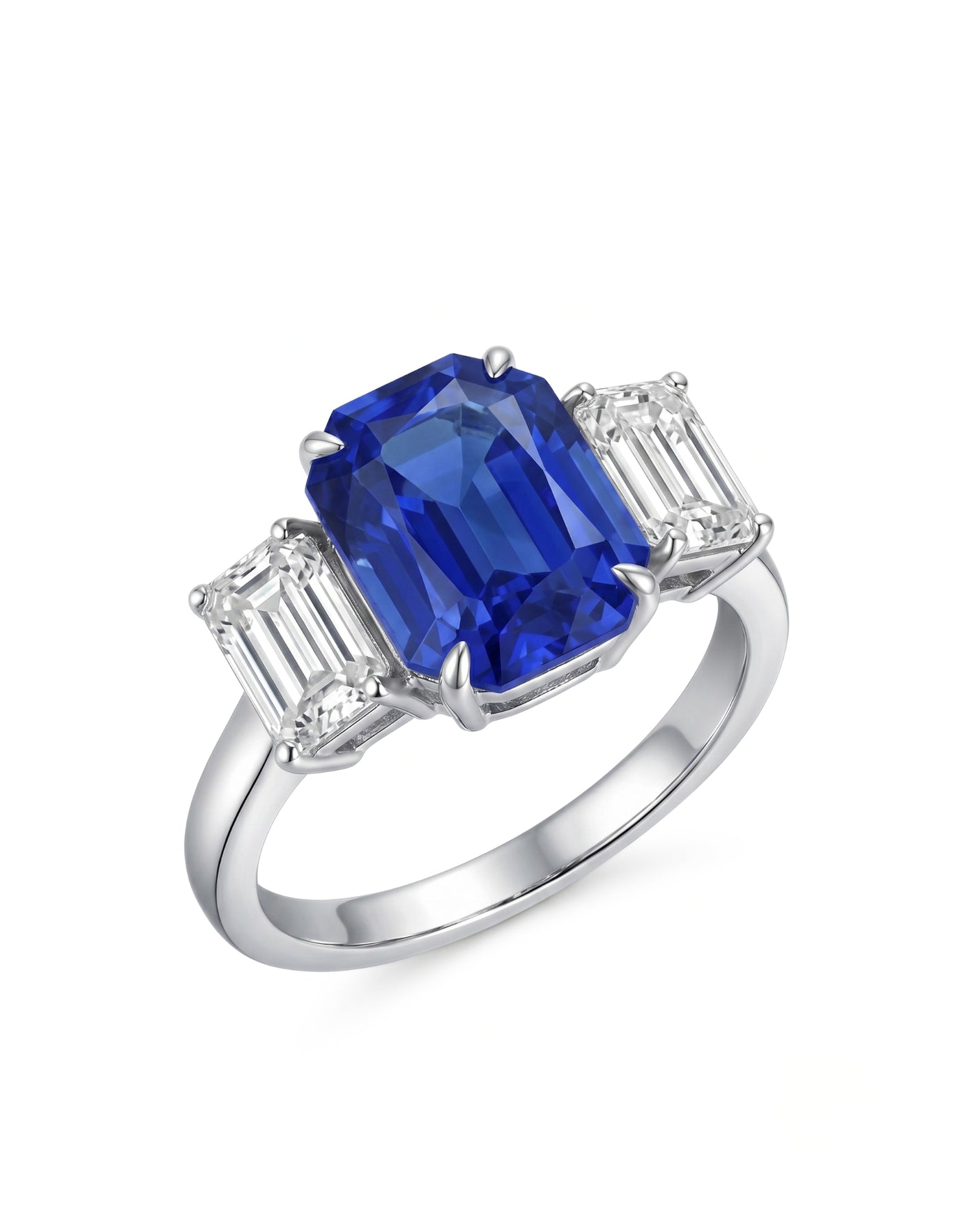 Emerald cut blue sapphire ring with emerald cut diamond accents in 18K white gold | SARATTI