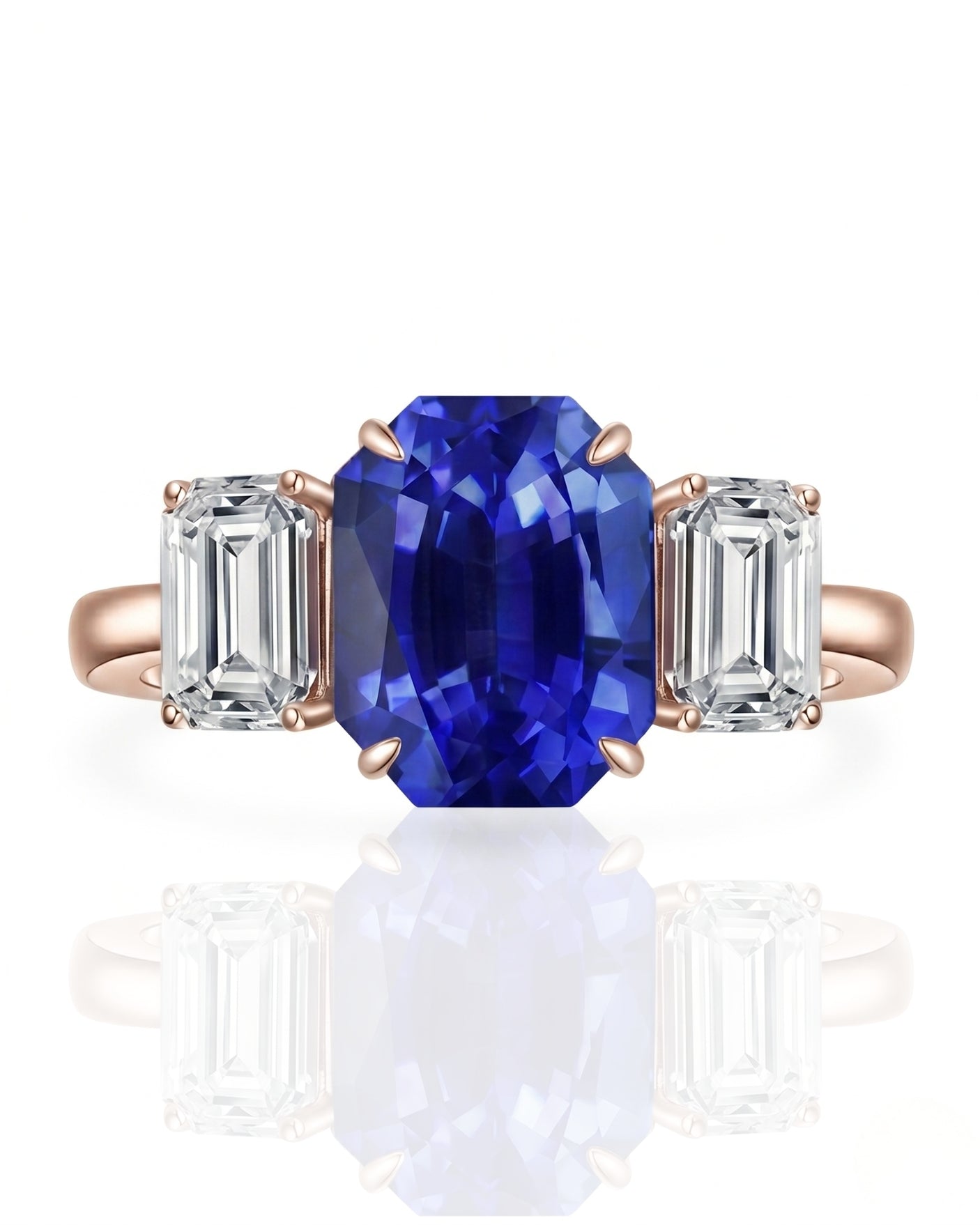 Emerald cut blue sapphire ring with emerald cut diamond accents in polished platinum | SARATTI