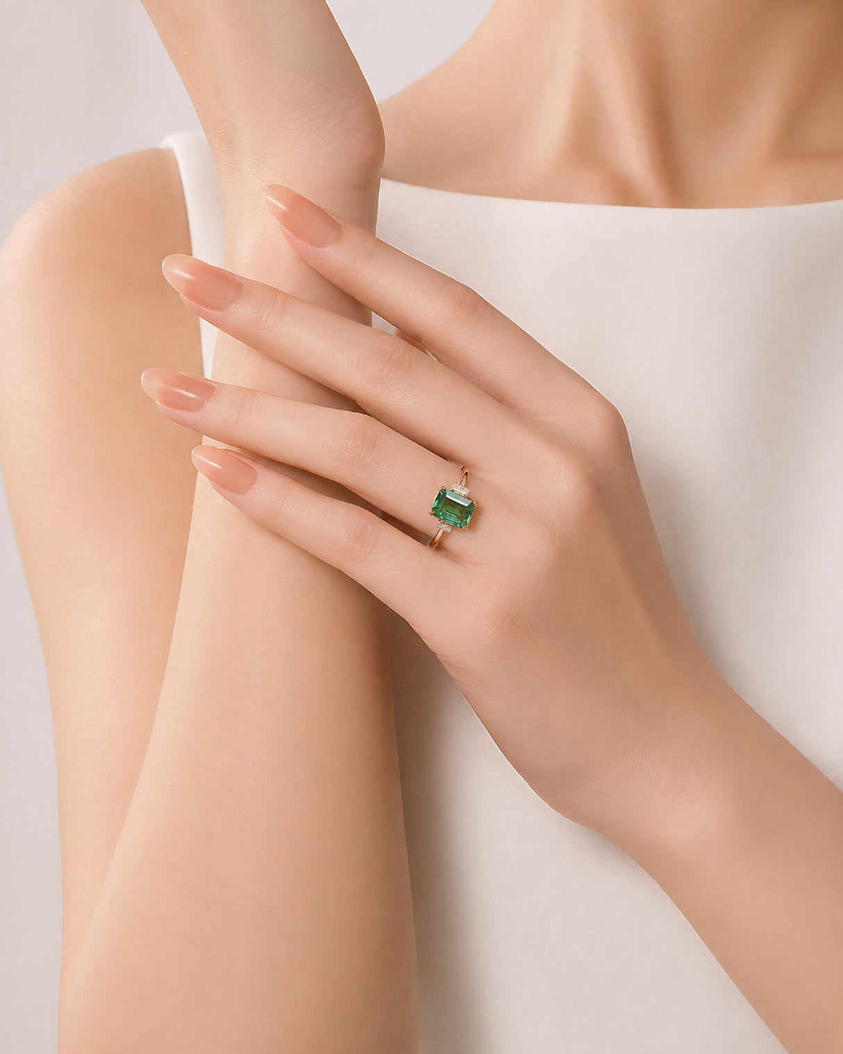 Emerald cut natural emerald three stone ring in 18K White Gold | SARATTI