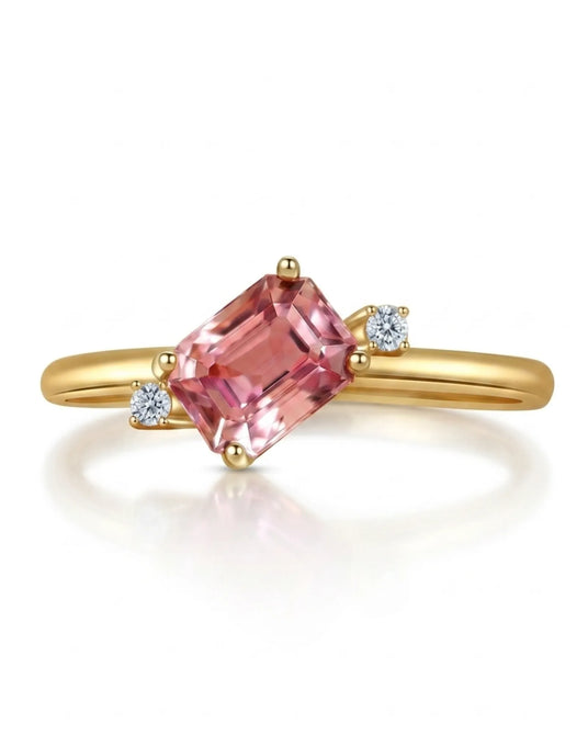 Emerald cut pink tourmaline ring with two diamond accents in 18K yellow gold | SARATTI