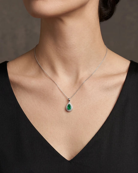 Emerald teardrop pendant with layered diamond frame and refined PT900 platinum setting | SARATTI