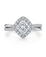Renea – Majestic Grace Natural Round Diamond Two-Tone Halo Ring