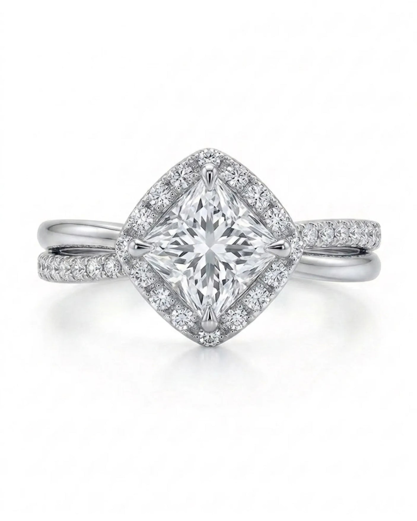 Renea – Majestic Grace Natural Round Diamond Two-Tone Halo Ring