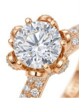 Floral basket moissanite ring with round center stone and pavé-set petals in 18K rose gold | SARATTI