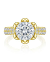 Floral basket moissanite ring with round center stone and pavé-set petals in 18K yellow gold | SARATTI