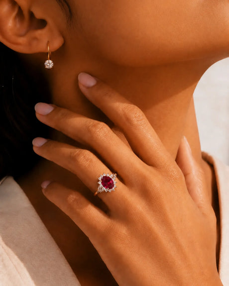 Floral halo rubellite tourmaline ring with round diamonds and romantic 18K rose gold setting | SARATTI