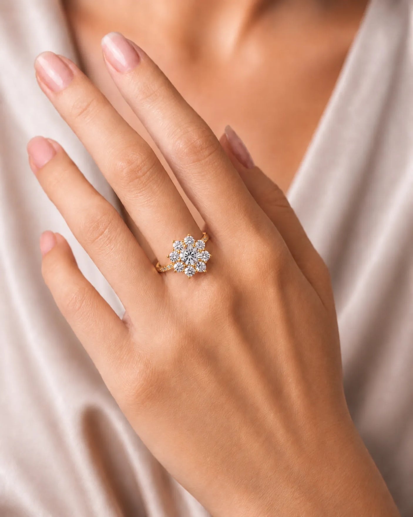 Floral moissanite ring with round center and eight petal-like accents in 18K yellow gold | SARATTI