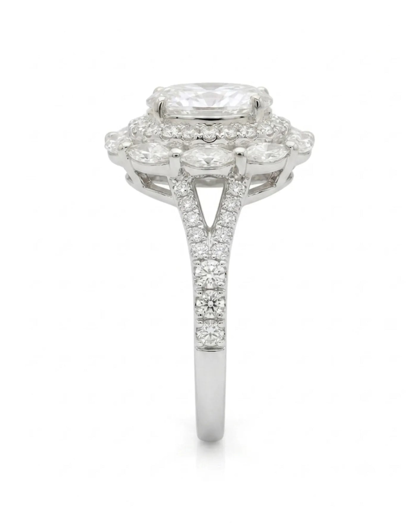 Floral oval moissanite ring with layered side stones and pavé split band in platinum | SARATTI