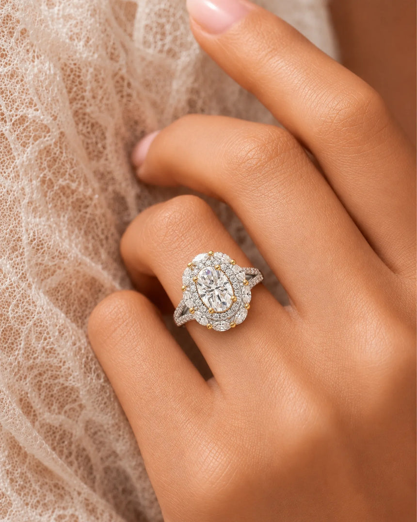Floral oval moissanite ring with layered side stones and pavé split band in two tone | SARATTI