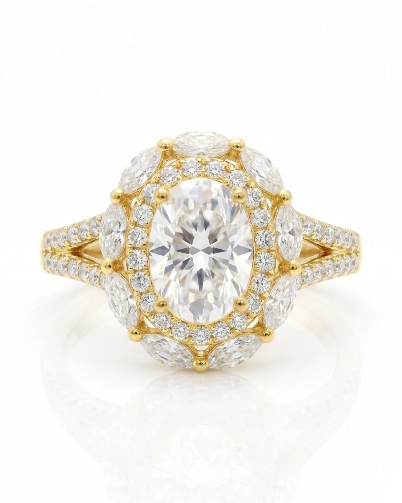 Floral oval moissanite ring with layered side stones and pavé split band in yellow gold | SARATTI