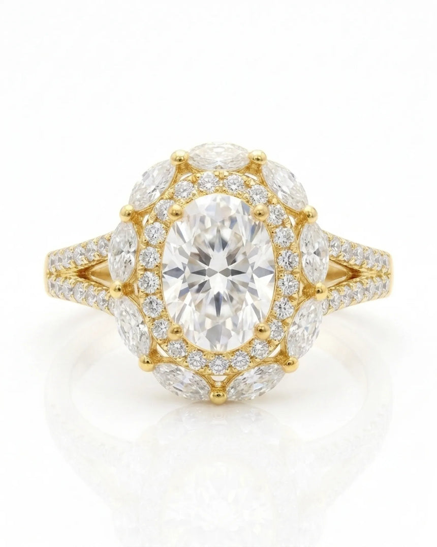 Floral oval moissanite ring with layered side stones and pavé split band in yellow gold | SARATTI