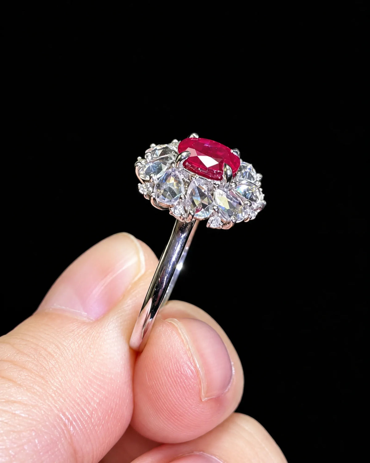Floral ruby ring featuring layered marquise white sapphire petals and delicate diamonds in 18K white gold - SARATTI
