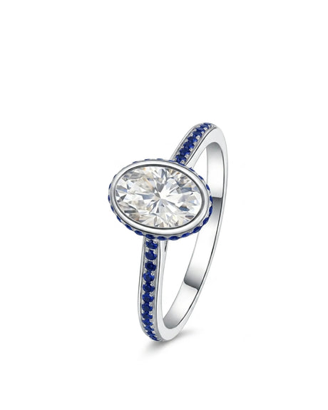 Freya oval natural diamond engagement ring with blue sapphire halo and band in 18K white gold | SARATTI