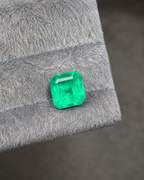 GUILD-certified Natural Emerald octagonal loose gemstone at an alternate angle | SARATTI