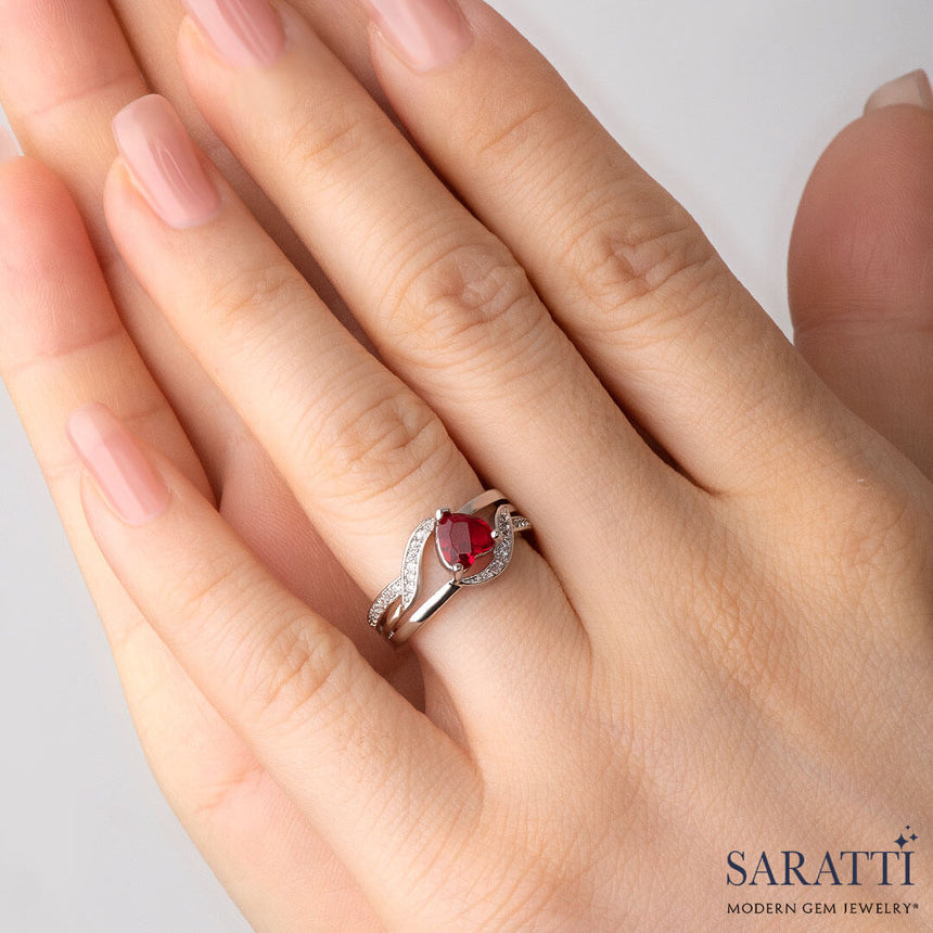 Model wears the 18 K Gold Garnet Ring  | Saratti 