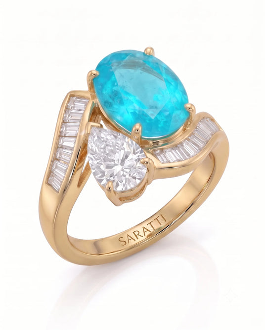 Yellow gold view of Élan Céleste Oval Paraiba Tourmaline and pear diamond Toi et Moi setting | SARATTI