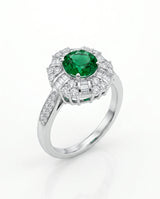 Round emerald birthstone ring with diamonds in 18K white gold | SARATTI
