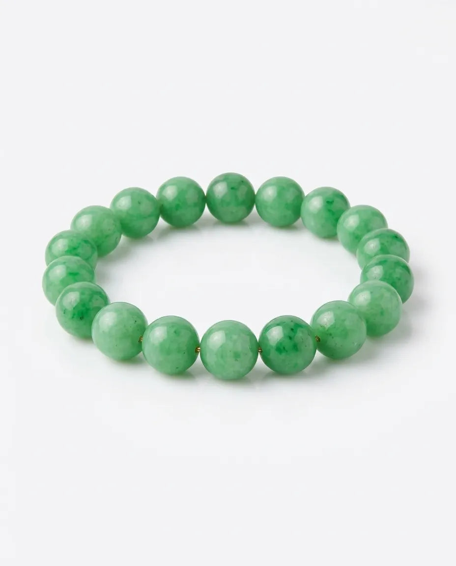 LUCIA polished jadeite bead surface and green colour detail close-up - SARATTI