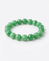 LUCIA polished jadeite bead surface and green colour detail close-up - SARATTI