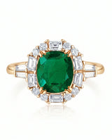 Natural emerald halo ring in 18K yellow gold | SARATTI
