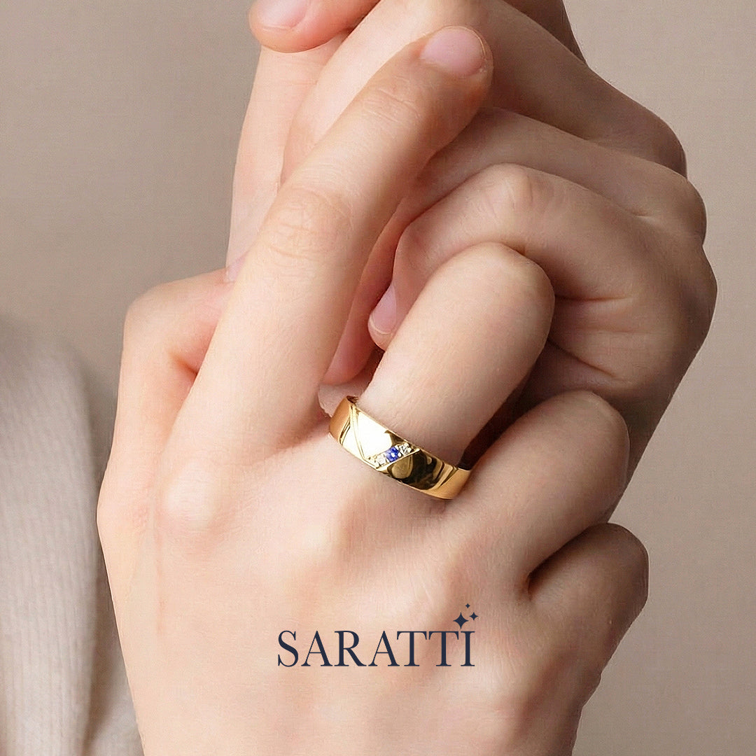 6mm men diamond and sapphire three stone ring worn on model in 18K yellow gold | SARATTI