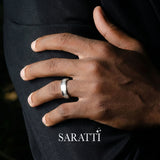 Roman Numeral ring worn on hand in 18K white gold | SARATTI