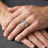 Emerald cut diamond wedding band handcrafted tension set diamond ring in 18K white gold | SARATTI
