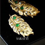 Luxury emerald and pearl feather pin in 18K gold | SARATTI