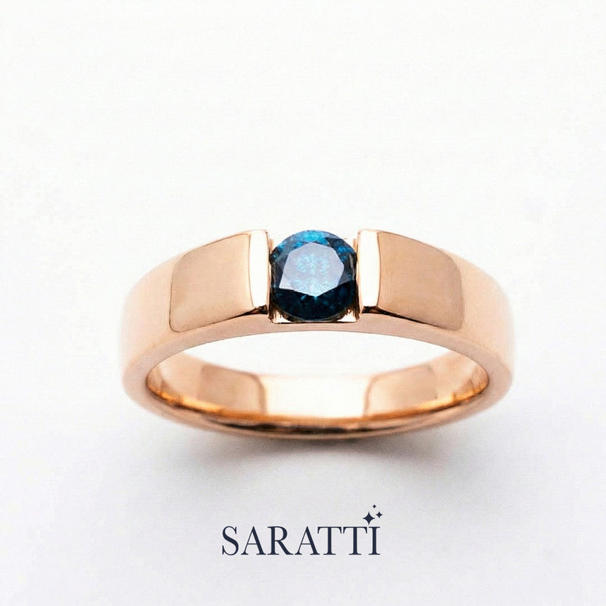 Blue mens wedding band round blue diamond tension set detail in 18K rose gold | SARATTI