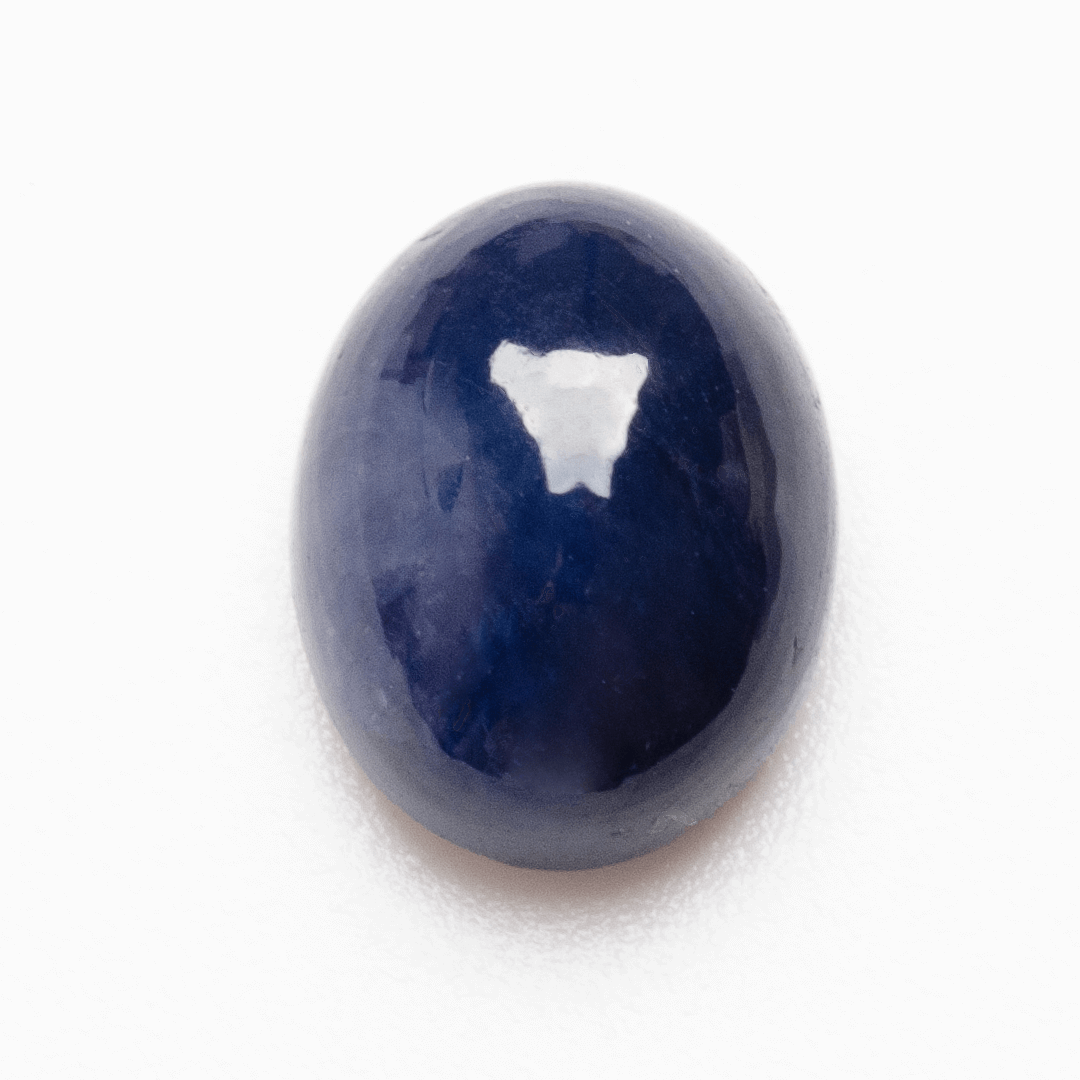 Genuine oval cabochon sapphire with glowing midnight blue hue | SARATTI